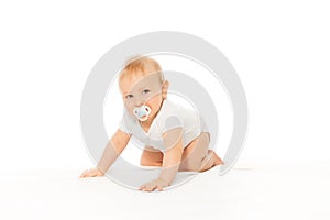 Baby with passy in his mouth wear white bodysuit