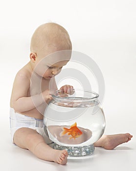 Baby with pet fish