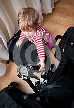 Baby with photography gear