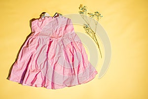 baby pink dress flat lay copyspace