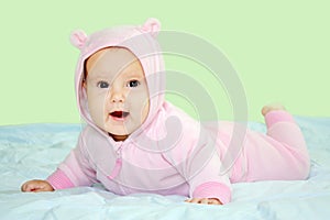 Baby in pink teddy costume