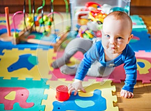 Baby play in his room, many toys