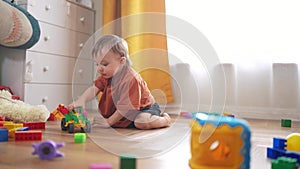 baby play with toys on the floor in kindergarten. happy family kid dream kindergarten concept. baby toddler boy playing