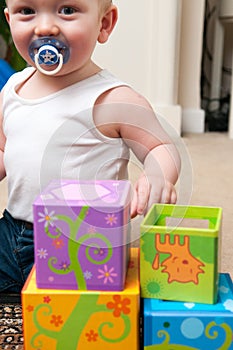 Baby playing with blocks