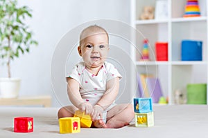 Baby playing with building block toys