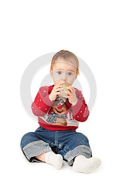 Baby playing with Christmas balls, isolated on white