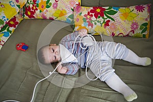 Baby playing in cot