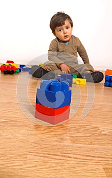 Baby playing in empty room