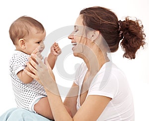 Baby playing with her mother.