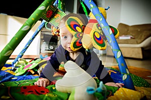 Baby playing indoor. Child, infant.