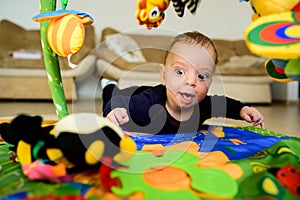 Baby playing indoor. Child, infant.