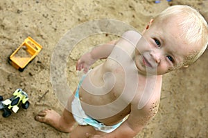 Baby Playing in Sandbox