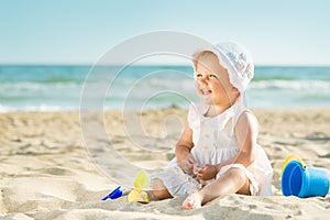 Baby playing at the sea