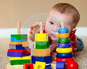 Baby playing with stacking learning toy