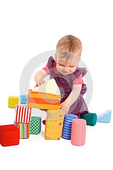 Baby playing with toy blocks