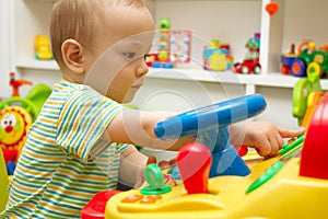 Baby Playing With The Toys