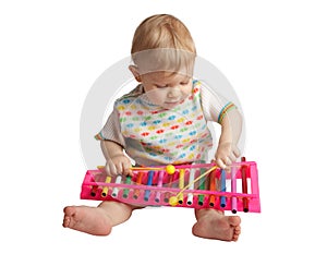 Baby plays musical toy