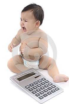 Baby with pocket calculator photo