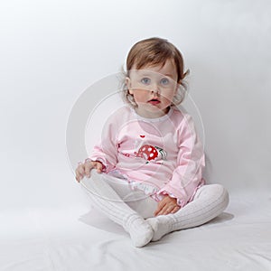 Baby posing in studio on white background