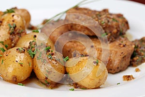 Baby potatoes with roast pork