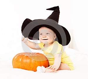 Baby with a pumpkin