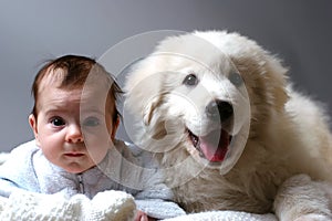 Baby and puppy