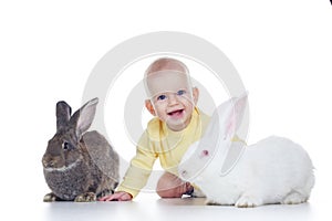 Baby and rabbits