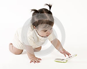 Baby reaching for cell phone