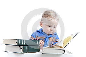 Baby reading books - education concept