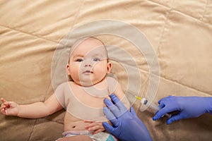 Baby receiving vaccine.