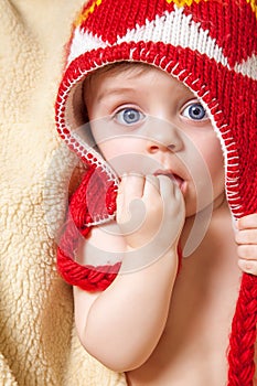 Baby in red bonnet