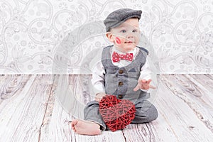 Baby with red kiss and heart