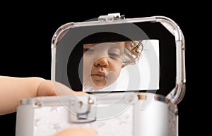 Baby reflection in the mirror, isolated