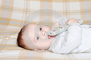 Baby with remote control