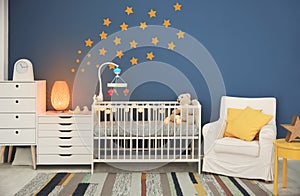 Baby room interior with comfortable crib