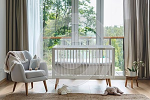 Baby room interior with crib and armchair, window and nature view