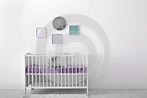 Baby room interior with crib photo