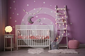 Baby room interior with crib near wall