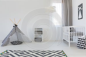 Baby room with white cot