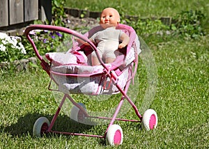 Baby's doll in a carriage