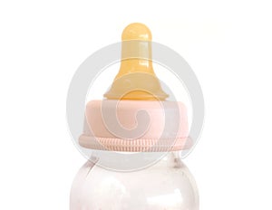 Baby's feeding bottle and a teat