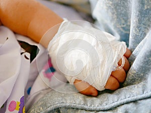 Baby`s hand with intravenouse & x28;IV& x29; catheter
