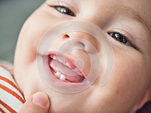 baby's mouth , the first small teeth