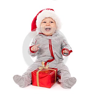 Un nino en un sombrero regalo de navidad cabina 
