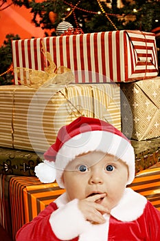 Baby santa with presents