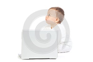 Baby sat with laptop computer