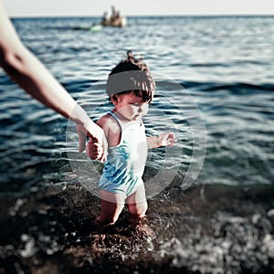 Baby on sea shore