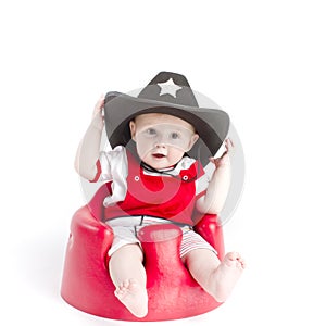 Baby in sheriffs hat photo