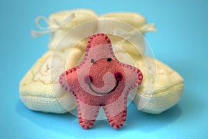 Baby shoes and star