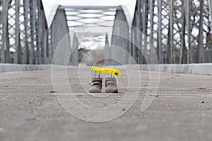 Baby shoes with yellow flowers